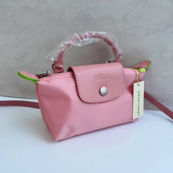 Longchamp Handbags - Petal Pink Mini Pouch • Unopened